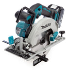 Makita Cordless Circular Saw in teal, black and grey colour on a white background.
