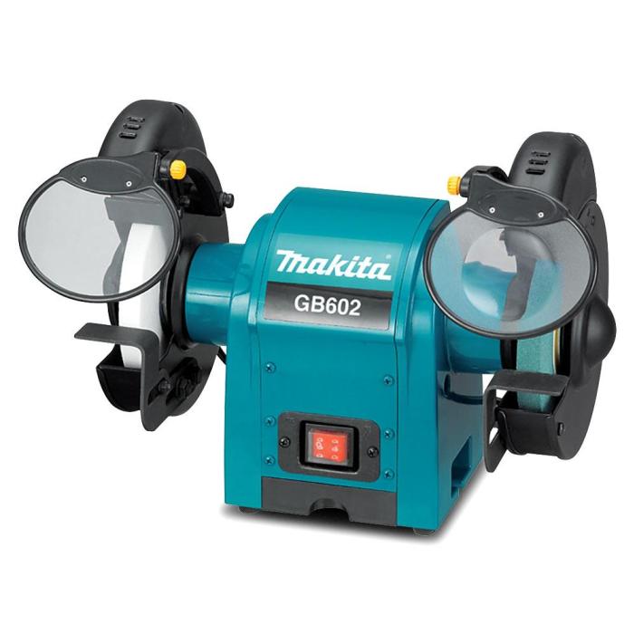 Makita bench grinder on a white background
