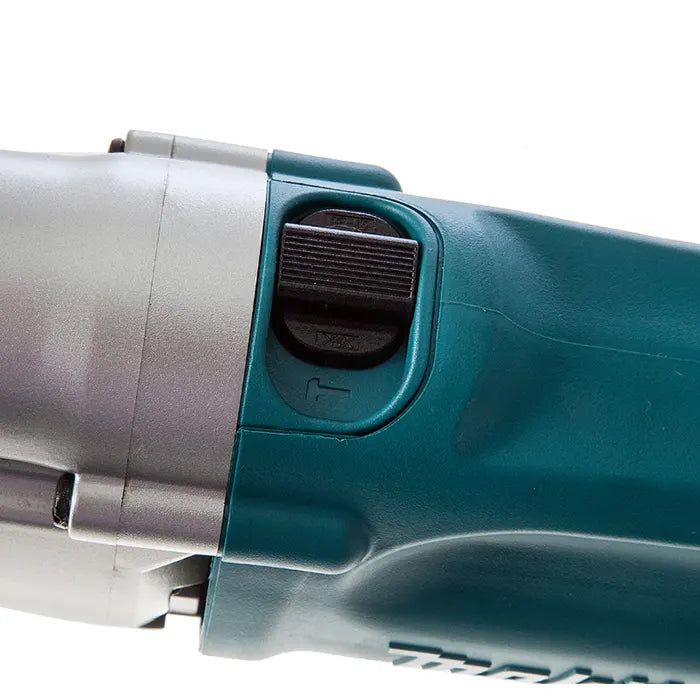 Close-up of a teal and silver Makita drill machine showing a black switch labeled 12V/24V.