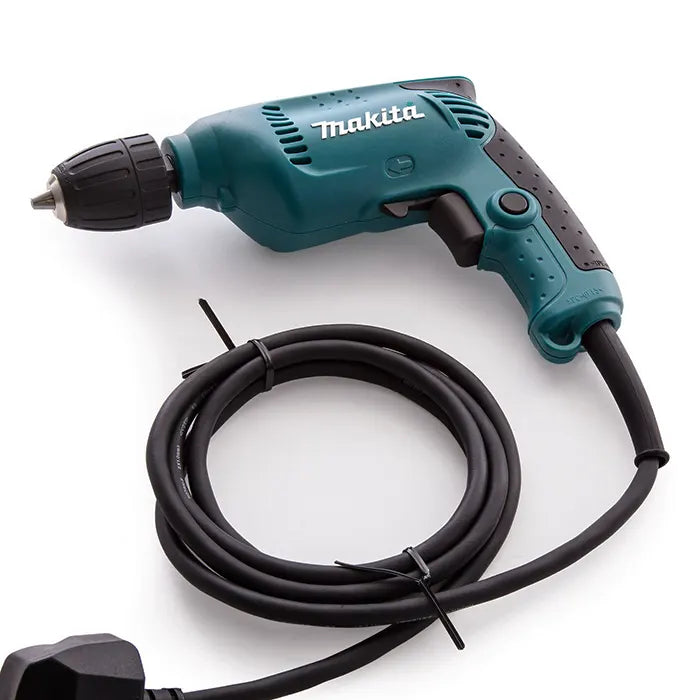 A teal and black Makita cordless drill with a coiled black power cord and plug, photographed on a clean white background.