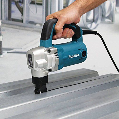 Makita Nibbler For Steel, Aluminum being used on a metal surface
