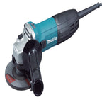 Makita angle grinder with a black dust collector attachment, silver motor housing, and a gray abrasive disc, shown on a white background.