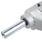 Close-up of a silver Makita Paint Mixer Machine attachment with a cylindrical chuck and a polished metal shank, shown against a plain white background.