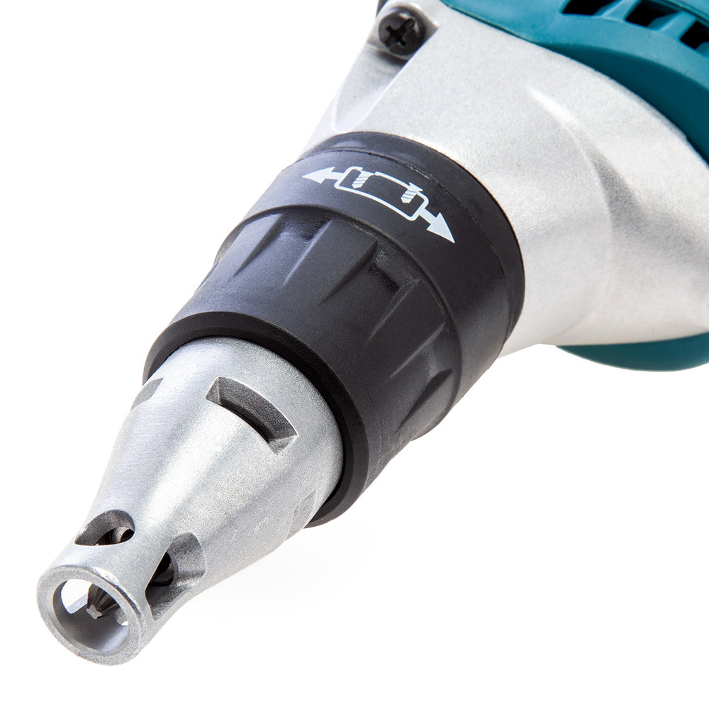 Close-up of a Makita Dry Wall Screwdriver bit holder with a silver metal chuck, black adjustment ring, and white directional arrow, shown on a white background.
