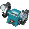 Makita dual-bevel bench grinder with a teal and black body, featuring two rotating grinding wheels and clear protective guards on a white background.