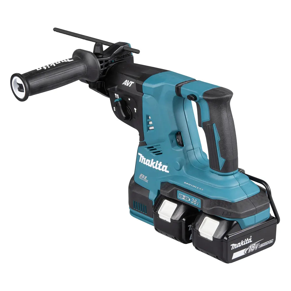 Makita cordless hammer drill with a teal and black body, featuring a built-in flashlight on the choker and dual 18V batteries attached, shown on a solid white background.
