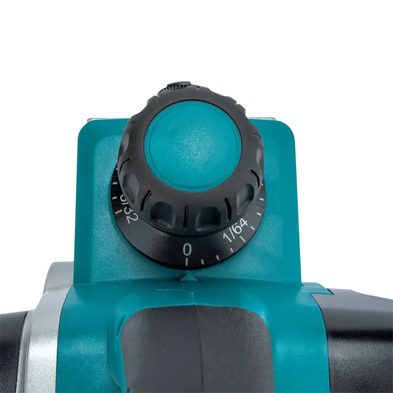 Close-up of a teal and black cordless Makita power tool showing the speed adjustment dial with white markings on a white background.