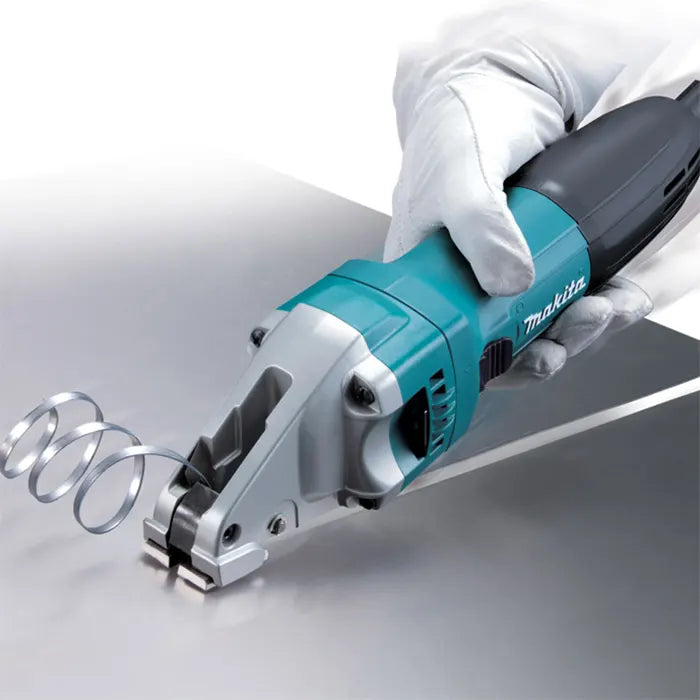 Makita Electric Metal Shear in teal and black colour with white makita logo in white background being used by a person