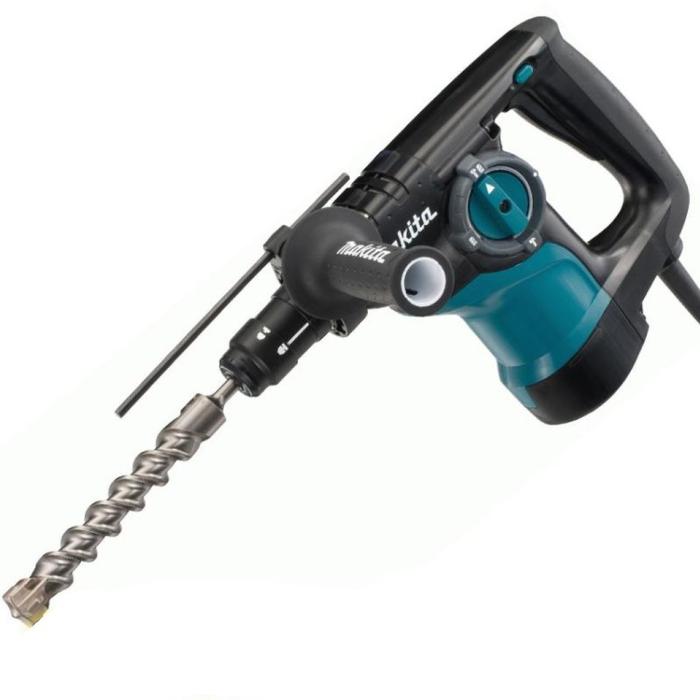 Makita rotary hammer with a spiral coring bit, shown on a clean white background.