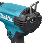 Close-up of a Makita cordless hot gun showing the teal and black body, vented housing, metal loop, and control markings on a white background.