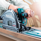 A person using a Makita circular saw guide rail system on a wooden board, with the Makita circular saw as the main product shown in a real-use scenario.